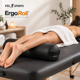 VSL Sports ErgoRoll – Επαγγελματικό κυλινδρικό μαξιλάρι μασάζ 65x15cm κάτω από τους αστραγάλους γυναίκας σε κρεβάτι μασάζ, για άνετη στήριξη των ποδιών.